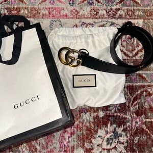 Gucci Black Leather Bag with Gold Accents